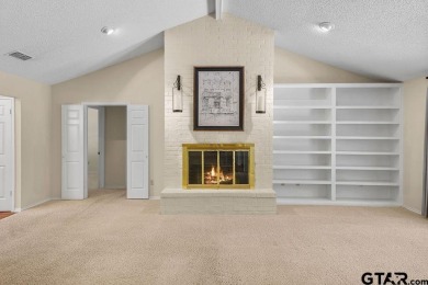 Nestled among mature trees, this charming 3 bedroom, 2 bath home on Hide-A-Way Lake Golf Course in Texas - for sale on GolfHomes.com, golf home, golf lot