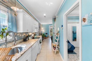 Welcome to your charming coastal retreat! Tucked within a golf on Indigo Creek Golf Club in South Carolina - for sale on GolfHomes.com, golf home, golf lot