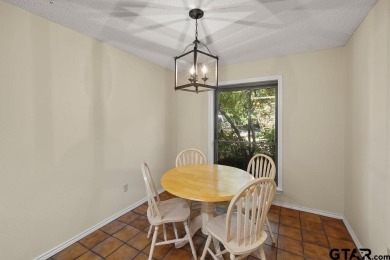 Nestled among mature trees, this charming 3 bedroom, 2 bath home on Hide-A-Way Lake Golf Course in Texas - for sale on GolfHomes.com, golf home, golf lot