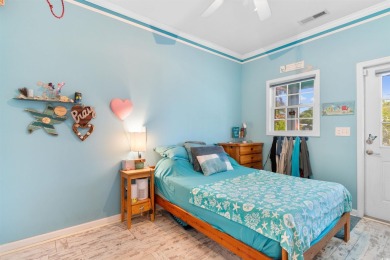 Welcome to your charming coastal retreat! Tucked within a golf on Indigo Creek Golf Club in South Carolina - for sale on GolfHomes.com, golf home, golf lot