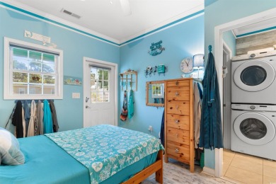 Welcome to your charming coastal retreat! Tucked within a golf on Indigo Creek Golf Club in South Carolina - for sale on GolfHomes.com, golf home, golf lot