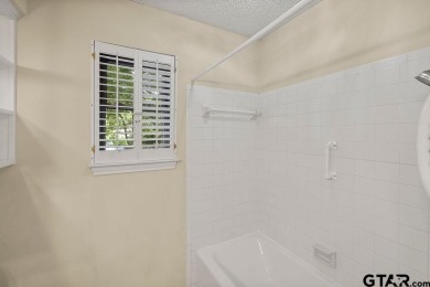 Nestled among mature trees, this charming 3 bedroom, 2 bath home on Hide-A-Way Lake Golf Course in Texas - for sale on GolfHomes.com, golf home, golf lot