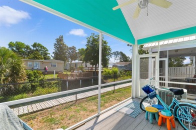 Welcome to your charming coastal retreat! Tucked within a golf on Indigo Creek Golf Club in South Carolina - for sale on GolfHomes.com, golf home, golf lot