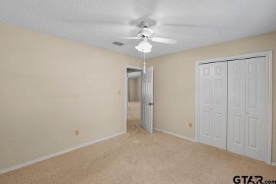 Nestled among mature trees, this charming 3 bedroom, 2 bath home on Hide-A-Way Lake Golf Course in Texas - for sale on GolfHomes.com, golf home, golf lot