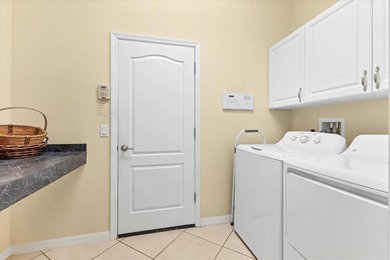 Wide lake views, premier golf scenery, and effortless Florida on Heron Creek Golf and Country Club in Florida - for sale on GolfHomes.com, golf home, golf lot