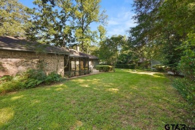 Nestled among mature trees, this charming 3 bedroom, 2 bath home on Hide-A-Way Lake Golf Course in Texas - for sale on GolfHomes.com, golf home, golf lot