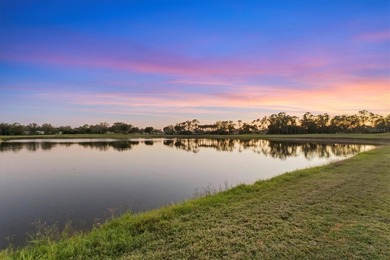 Wide lake views, premier golf scenery, and effortless Florida on Heron Creek Golf and Country Club in Florida - for sale on GolfHomes.com, golf home, golf lot