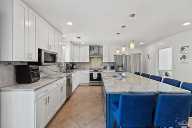 Discover effortless Florida living in this beautifully updated on Tiger Point Golf and Country Club in Florida - for sale on GolfHomes.com, golf home, golf lot