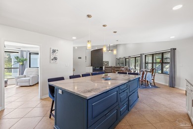 Discover effortless Florida living in this beautifully updated on Tiger Point Golf and Country Club in Florida - for sale on GolfHomes.com, golf home, golf lot