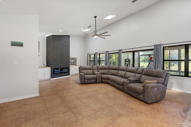 Discover effortless Florida living in this beautifully updated on Tiger Point Golf and Country Club in Florida - for sale on GolfHomes.com, golf home, golf lot