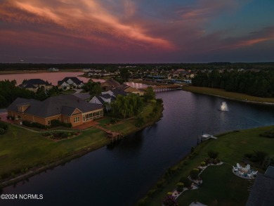 Experience luxury coastal living in the serene community of on Compass Pointe Golf Course in North Carolina - for sale on GolfHomes.com, golf home, golf lot