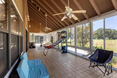 Discover effortless Florida living in this beautifully updated on Tiger Point Golf and Country Club in Florida - for sale on GolfHomes.com, golf home, golf lot