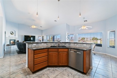 Live like you are on vacation every day in this resort-like on Desert Lakes Golf Course in Arizona - for sale on GolfHomes.com, golf home, golf lot