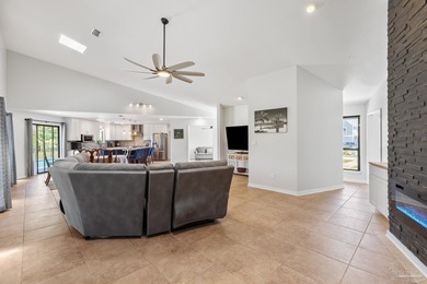 Discover effortless Florida living in this beautifully updated on Tiger Point Golf and Country Club in Florida - for sale on GolfHomes.com, golf home, golf lot