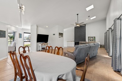 Discover effortless Florida living in this beautifully updated on Tiger Point Golf and Country Club in Florida - for sale on GolfHomes.com, golf home, golf lot