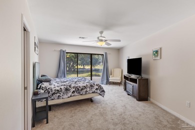 Discover effortless Florida living in this beautifully updated on Tiger Point Golf and Country Club in Florida - for sale on GolfHomes.com, golf home, golf lot