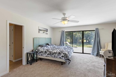 Discover effortless Florida living in this beautifully updated on Tiger Point Golf and Country Club in Florida - for sale on GolfHomes.com, golf home, golf lot