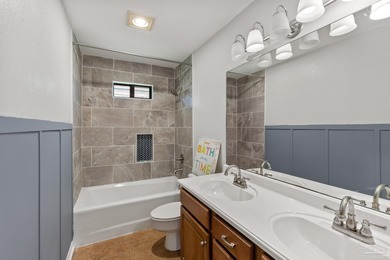 Discover effortless Florida living in this beautifully updated on Tiger Point Golf and Country Club in Florida - for sale on GolfHomes.com, golf home, golf lot