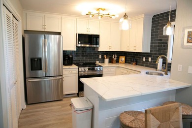Welcome to this beautifully updated 2-bedroom, 2-bath condo on The Plantation Course At Edisto in South Carolina - for sale on GolfHomes.com, golf home, golf lot