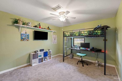 Discover effortless Florida living in this beautifully updated on Tiger Point Golf and Country Club in Florida - for sale on GolfHomes.com, golf home, golf lot