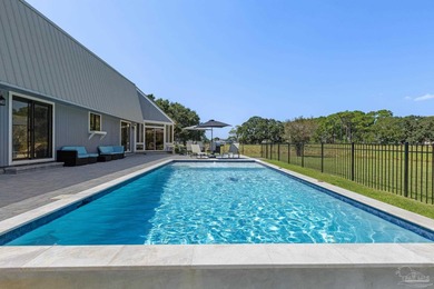 Discover effortless Florida living in this beautifully updated on Tiger Point Golf and Country Club in Florida - for sale on GolfHomes.com, golf home, golf lot