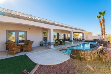 Live like you are on vacation every day in this resort-like on Desert Lakes Golf Course in Arizona - for sale on GolfHomes.com, golf home, golf lot
