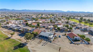 Live like you are on vacation every day in this resort-like on Desert Lakes Golf Course in Arizona - for sale on GolfHomes.com, golf home, golf lot
