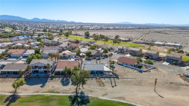 Live like you are on vacation every day in this resort-like on Desert Lakes Golf Course in Arizona - for sale on GolfHomes.com, golf home, golf lot