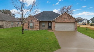 Welcome to this beautiful home located in highly sought after on Star Harbor Golf Club in Texas - for sale on GolfHomes.com, golf home, golf lot