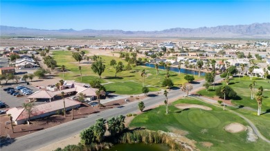 Live like you are on vacation every day in this resort-like on Desert Lakes Golf Course in Arizona - for sale on GolfHomes.com, golf home, golf lot