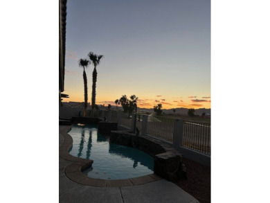 Live like you are on vacation every day in this resort-like on Desert Lakes Golf Course in Arizona - for sale on GolfHomes.com, golf home, golf lot