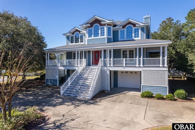 This 5-bedroom, 6.5-bath residence offers over 3,600 square feet on The Currituck Golf Club in North Carolina - for sale on GolfHomes.com, golf home, golf lot