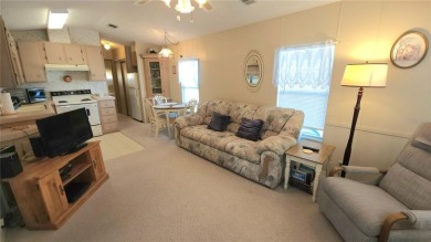 TWO BED, ONE BATH HOME IN ACTIVE 55+ COMMUNITY! This furnished on River Run Golf Links in Florida - for sale on GolfHomes.com, golf home, golf lot