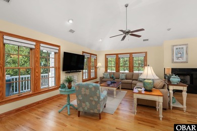 This 5-bedroom, 6.5-bath residence offers over 3,600 square feet on The Currituck Golf Club in North Carolina - for sale on GolfHomes.com, golf home, golf lot