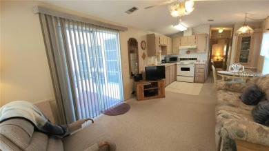 TWO BED, ONE BATH HOME IN ACTIVE 55+ COMMUNITY! This furnished on River Run Golf Links in Florida - for sale on GolfHomes.com, golf home, golf lot