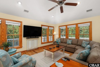This 5-bedroom, 6.5-bath residence offers over 3,600 square feet on The Currituck Golf Club in North Carolina - for sale on GolfHomes.com, golf home, golf lot