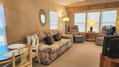 TWO BED, ONE BATH HOME IN ACTIVE 55+ COMMUNITY! This furnished on River Run Golf Links in Florida - for sale on GolfHomes.com, golf home, golf lot