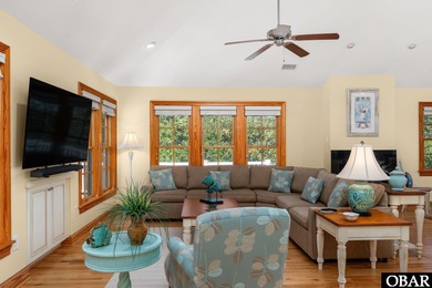 This 5-bedroom, 6.5-bath residence offers over 3,600 square feet on The Currituck Golf Club in North Carolina - for sale on GolfHomes.com, golf home, golf lot