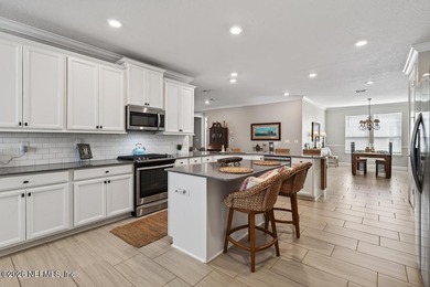 Welcome to this meticulously maintained 4-bedroom, 3-bathroom on The Palencia Club in Florida - for sale on GolfHomes.com, golf home, golf lot