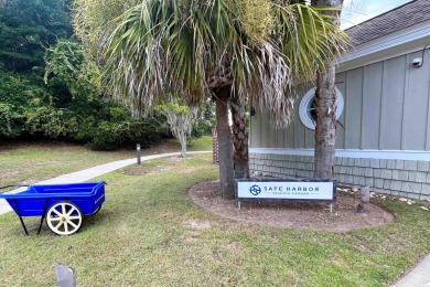 JUST STEPS TO THE WACCAMAW RIVER and a short bike ride to the on The Reserve Golf Club at Pawleys Island in South Carolina - for sale on GolfHomes.com, golf home, golf lot