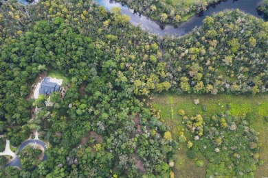 JUST STEPS TO THE WACCAMAW RIVER and a short bike ride to the on The Reserve Golf Club at Pawleys Island in South Carolina - for sale on GolfHomes.com, golf home, golf lot