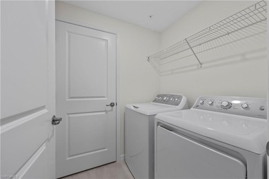 Perfectly positioned in The National Golf & Country Club at Ave on Panther Run Golf Club in Florida - for sale on GolfHomes.com, golf home, golf lot