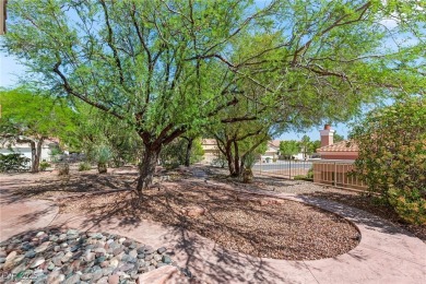 Location, location, location! Just a short cart path drive to on Highland Falls Golf Club in Nevada - for sale on GolfHomes.com, golf home, golf lot