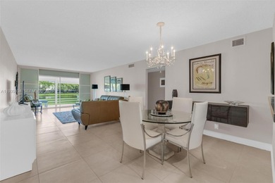 Discover this beautifully remodeled residence where elegance on Wynmoor Golf Course in Florida - for sale on GolfHomes.com, golf home, golf lot