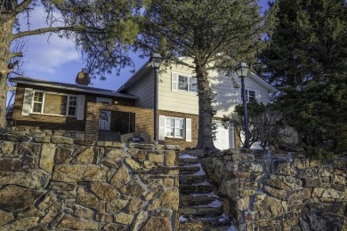 Discover the perfect blend of comfort and convenience at 2208 on Olive Glenn Golf and Country Club in Wyoming - for sale on GolfHomes.com, golf home, golf lot