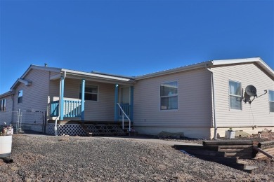 Dubois, WY home on golf course. This home offers 4,312 sq. ft on Antelope Hills Golf Course in Wyoming - for sale on GolfHomes.com, golf home, golf lot