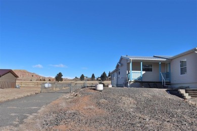 Dubois, WY home on golf course. This home offers 4,312 sq. ft on Antelope Hills Golf Course in Wyoming - for sale on GolfHomes.com, golf home, golf lot