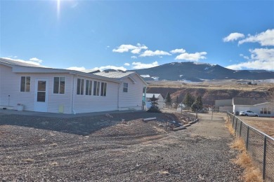 Dubois, WY home on golf course. This home offers 4,312 sq. ft on Antelope Hills Golf Course in Wyoming - for sale on GolfHomes.com, golf home, golf lot