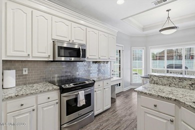 Beautiful home located in a desirable golf course community and on Bay Pointe Golf and Resort in Mississippi - for sale on GolfHomes.com, golf home, golf lot