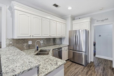 Beautiful home located in a desirable golf course community and on Bay Pointe Golf and Resort in Mississippi - for sale on GolfHomes.com, golf home, golf lot